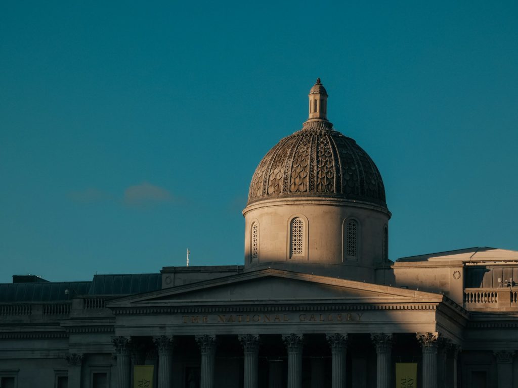 Domed neoclassical building against dusk sky