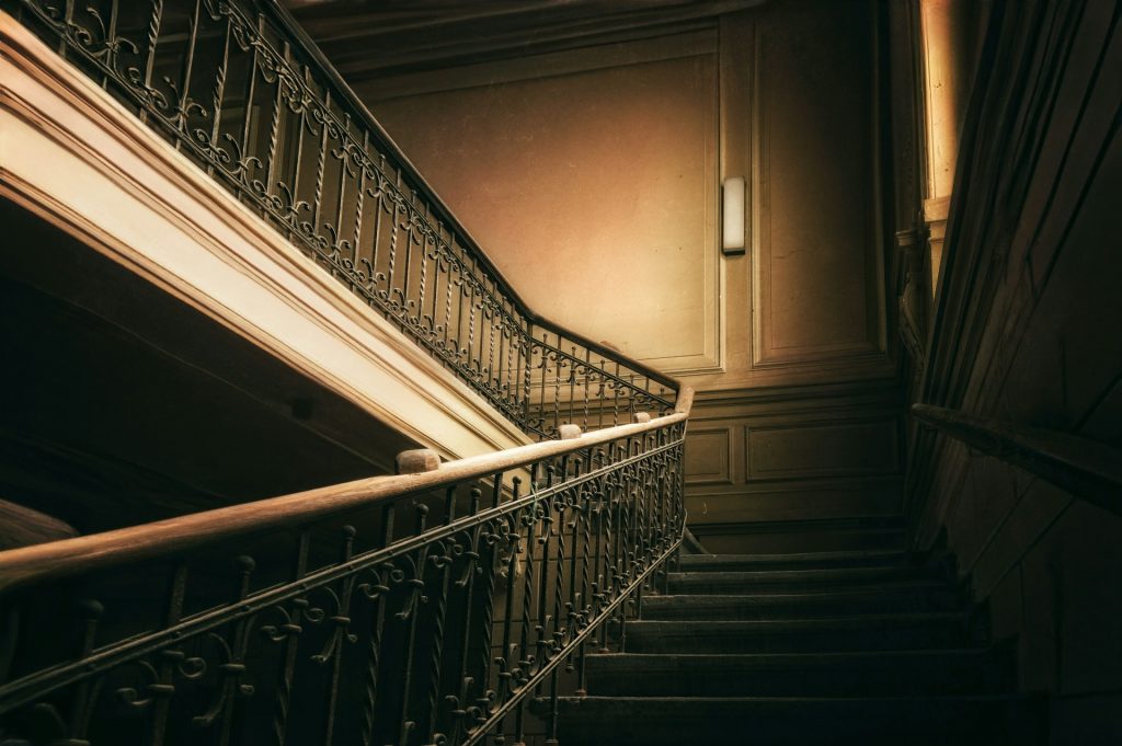 ACSS 4 Sections - 1 col 1 Dark stairwell curving upward